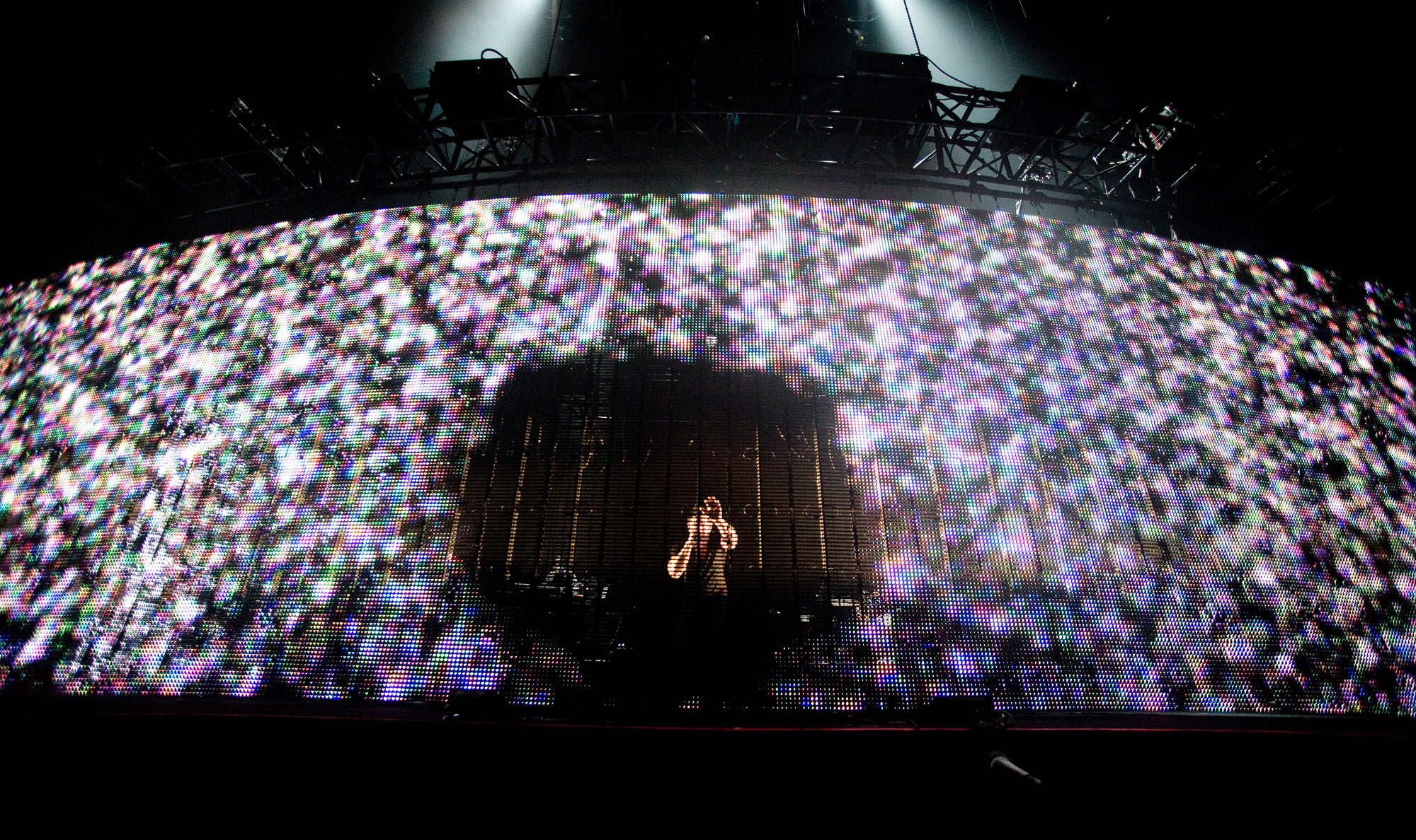 Trent Reznor on stage surrounded by static
