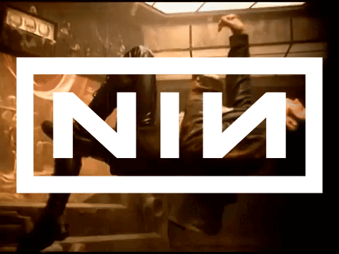 gif of trent reznor spinning with N I N overlayed