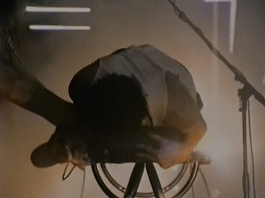 gif of trent reznor climbing on top of a keyboard and agressivly humping it